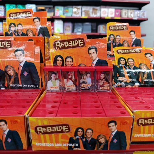 Apontador com depósito rebeldes TRIS